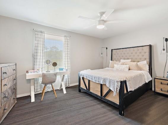 bedroom featuring ceiling fan and dark wood-type flooring