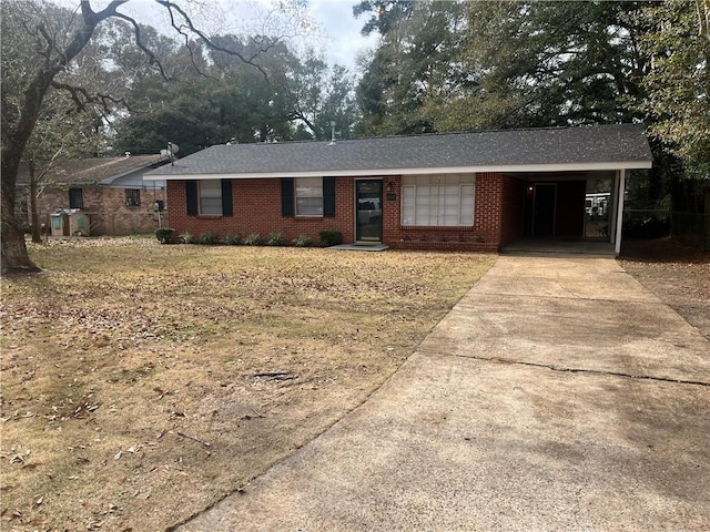 ranch-style house with a carport