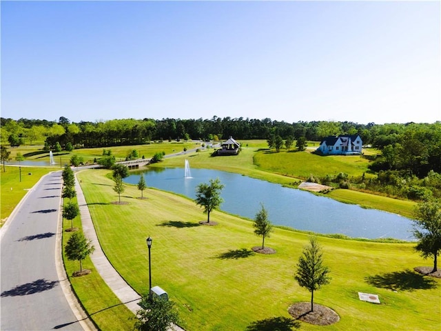 view of community with a water view