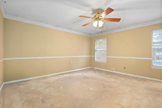 empty room with crown molding, carpet floors, and ceiling fan