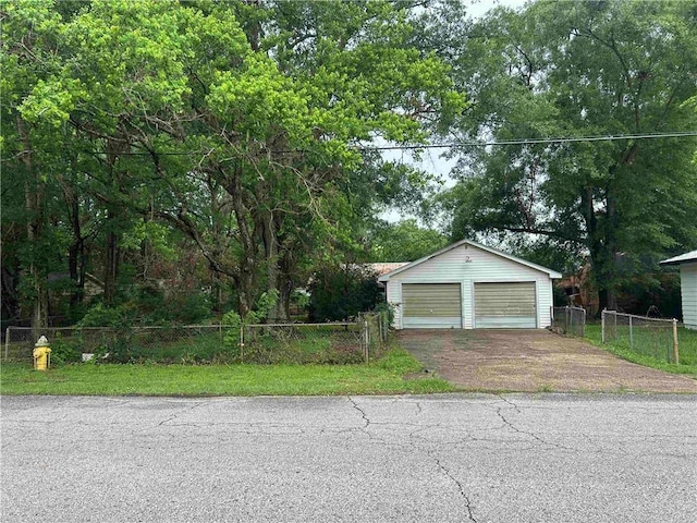 detached garage with fence