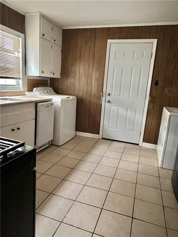1053 Lubel Ave, Mobile, AL 36617 - washroom with wooden walls and light tile patterned floors
