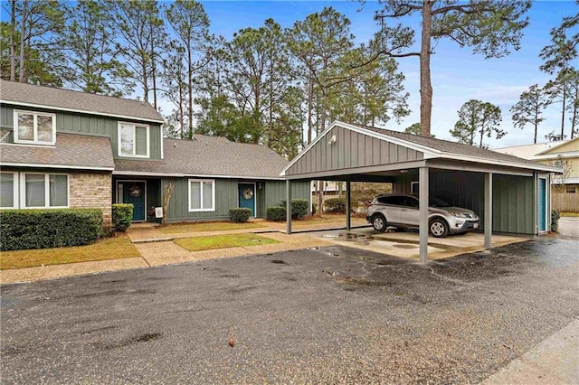 view of front of home featuring a carport