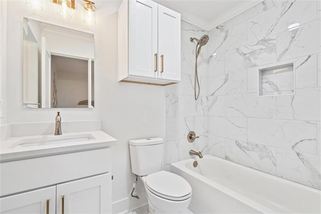 full bathroom featuring tiled shower / bath combo, toilet, crown molding, and vanity