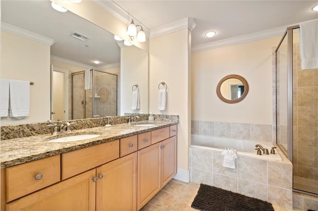 full bath featuring a bath, ornamental molding, a sink, and visible vents