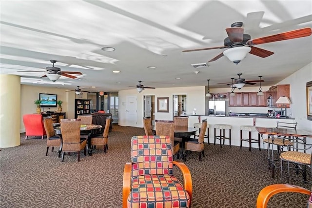 dining space featuring visible vents