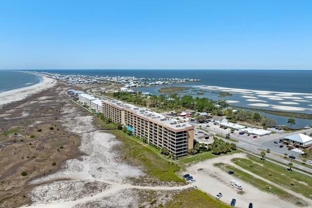 aerial view featuring a view of the beach and a water view