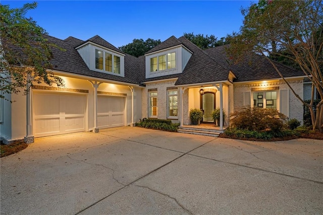 view of front of property featuring a garage