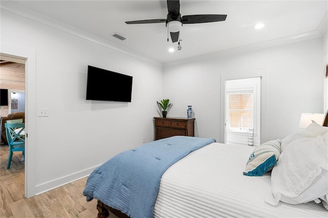 bedroom with light hardwood / wood-style floors, crown molding, and ceiling fan