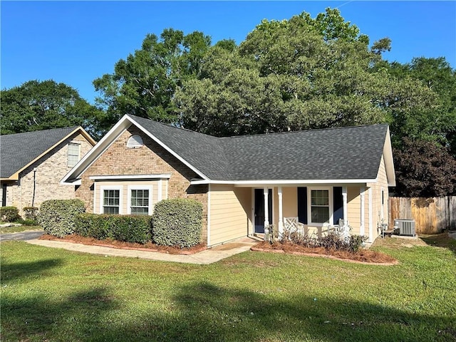 3120 Wellborne Dr W, Mobile, AL 36695 - ranch-style home featuring central AC unit, a shingled roof, brick siding, and covered porch