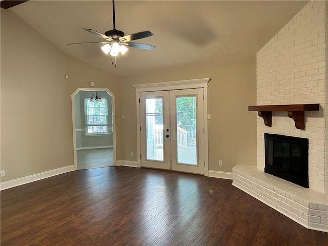 3120 Wellborne Dr W, Mobile, AL 36695 - unfurnished living room featuring vaulted ceiling, dark wood finished floors, ceiling fan, baseboards, and french doors