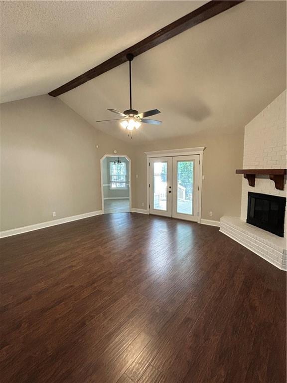 3120 Wellborne Dr W, Mobile, AL 36695 - unfurnished living room featuring dark wood-type flooring, a ceiling fan, french doors, baseboards, and a textured ceiling