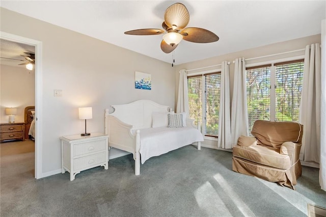 carpeted bedroom with visible vents, ceiling fan, and baseboards