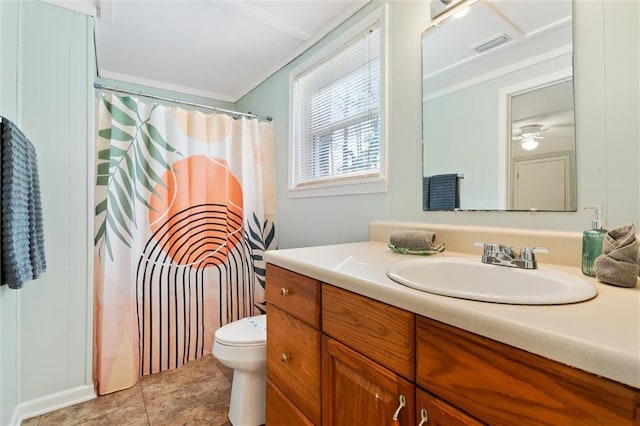 bathroom with tile patterned flooring, toilet, visible vents, vanity, and a shower with curtain