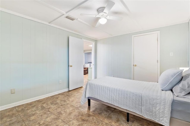 bedroom featuring ceiling fan, tile patterned flooring, visible vents, and baseboards