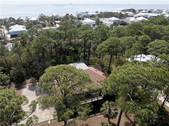 birds eye view of property with a residential view and a water view