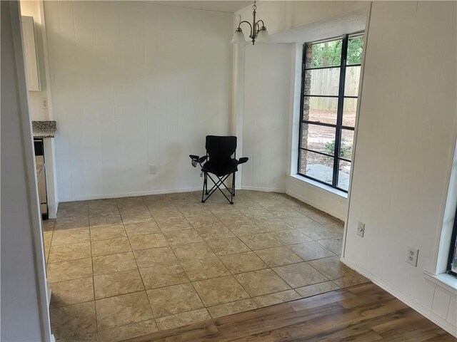 6290 Quail Ct, Theodore, AL 36582 - unfurnished dining area featuring healthy amount of natural light, baseboards, and a chandelier