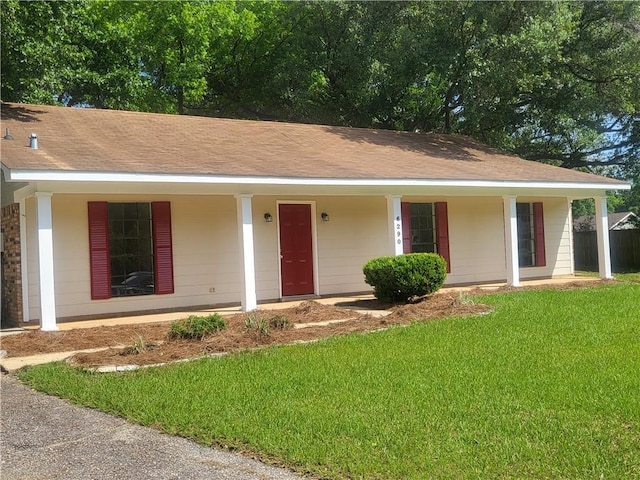 6290 Quail Ct, Theodore, AL 36582 - ranch-style house featuring a porch and a front lawn