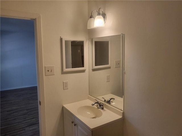 6290 Quail Ct, Theodore, AL 36582 - bathroom with vanity and wood finished floors