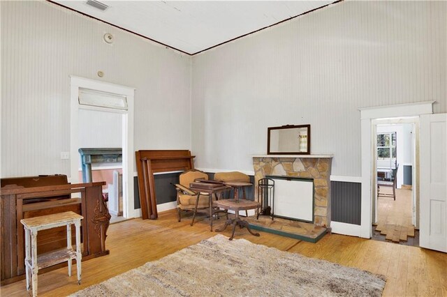 52780 State Highway 59, Stockton, AL 36579 - sitting room with a towering ceiling, wood finished floors, and a fireplace