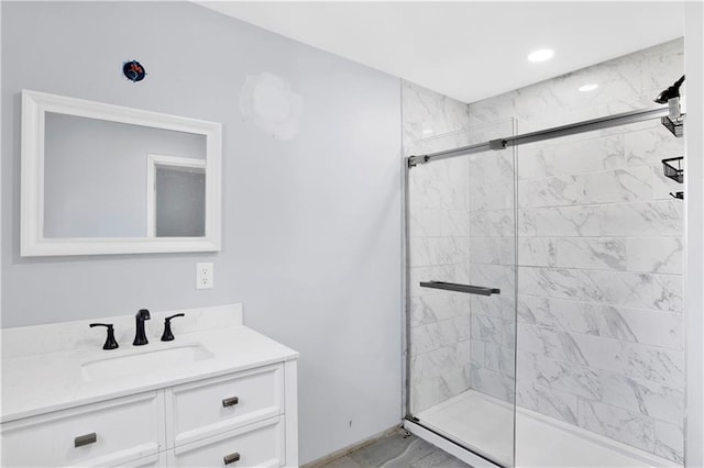52780 State Highway 59, Stockton, AL 36579 - bathroom featuring marble finish floor, vanity, and a stall shower