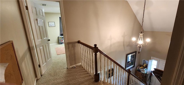 6325 Shadowlake Ct, Mobile, AL 36693 - corridor with an upstairs landing, carpet, a chandelier, and high vaulted ceiling
