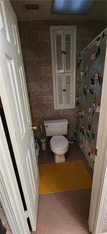 6325 Shadowlake Ct, Mobile, AL 36693 - bathroom with tile patterned flooring and a shower with curtain