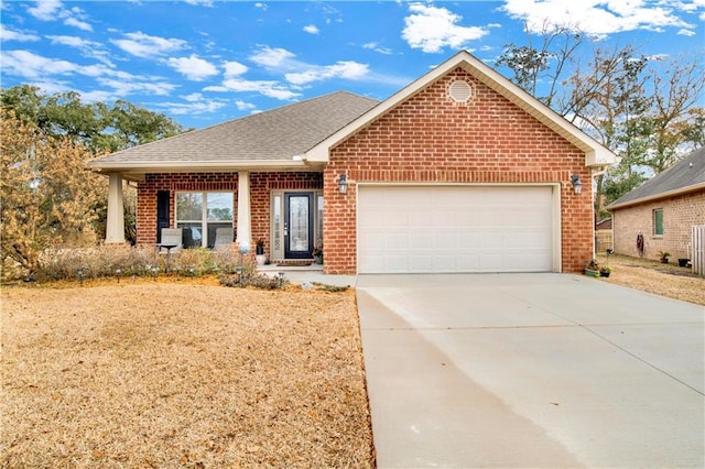 view of front of home featuring a garage and covered porch