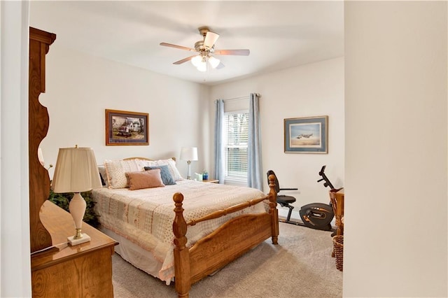 bedroom with light colored carpet and ceiling fan