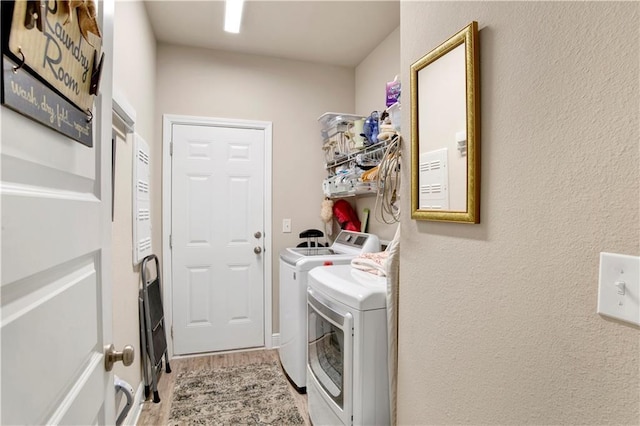 laundry room with washer and clothes dryer