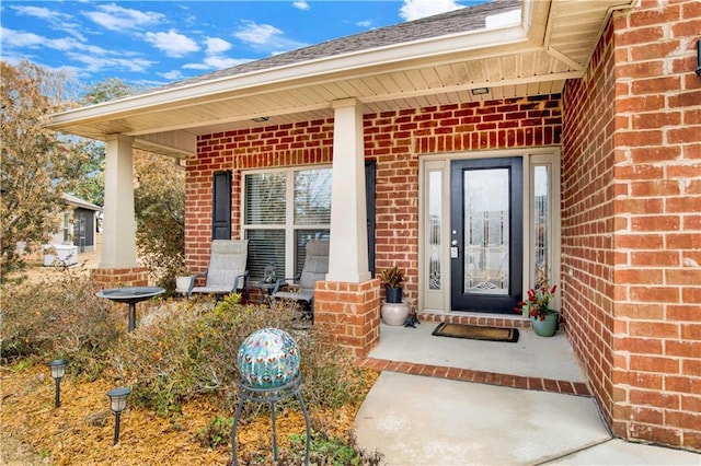 property entrance with covered porch