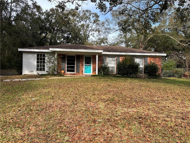 ranch-style house with a front lawn