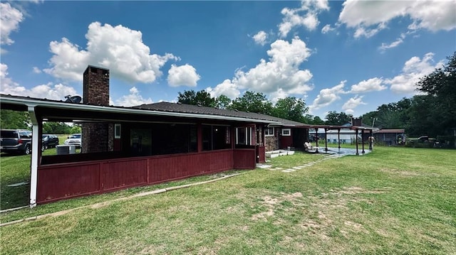 exterior space with a lawn