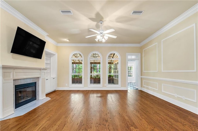 104 Ferncliff Cir, Daphne, AL 36526 - unfurnished living room with a ceiling fan, plenty of natural light, ornamental molding, and wood finished floors