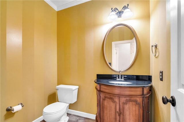 104 Ferncliff Cir, Daphne, AL 36526 - bathroom with toilet, vanity, baseboards, and crown molding