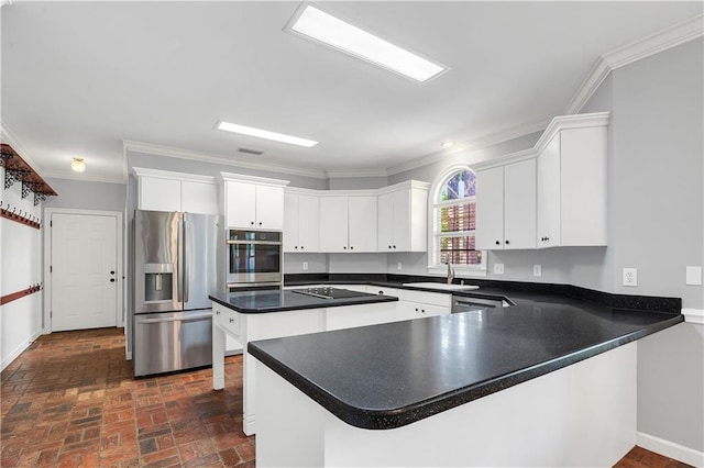 104 Ferncliff Cir, Daphne, AL 36526 - kitchen with appliances with stainless steel finishes, a sink, ornamental molding, brick patterned floors, and a peninsula