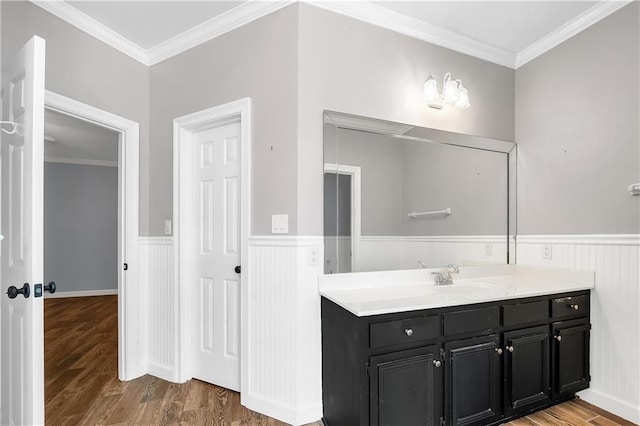 104 Ferncliff Cir, Daphne, AL 36526 - bathroom with vanity, wainscoting, wood finished floors, and ornamental molding
