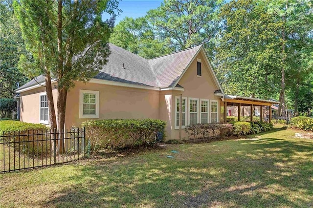 104 Ferncliff Cir, Daphne, AL 36526 - view of side of home with stucco siding and roof with shingles
