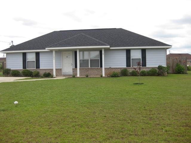 7684 Broome Ct, Theodore, AL 36582 - ranch-style house featuring a front lawn, brick siding, and a shingled roof