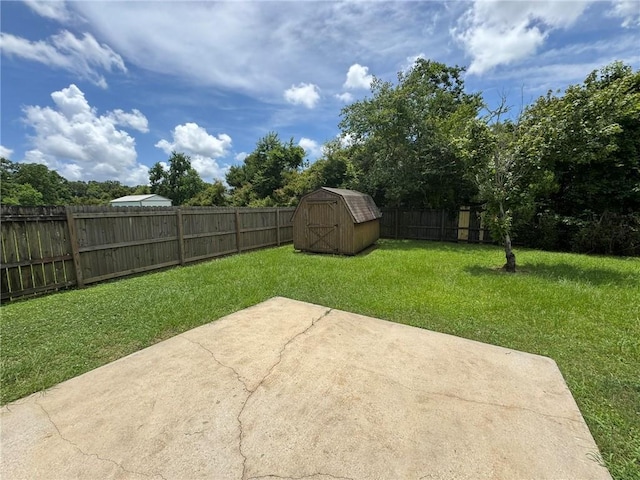 7684 Broome Ct, Theodore, AL 36582 - fenced backyard with a patio area and a shed