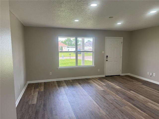 7684 Broome Ct, Theodore, AL 36582 - spare room with dark wood-type flooring, recessed lighting, and a textured ceiling
