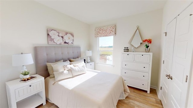 bedroom featuring light hardwood / wood-style floors