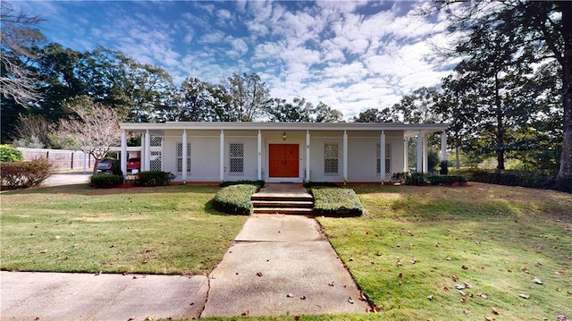 view of front of home with a front yard