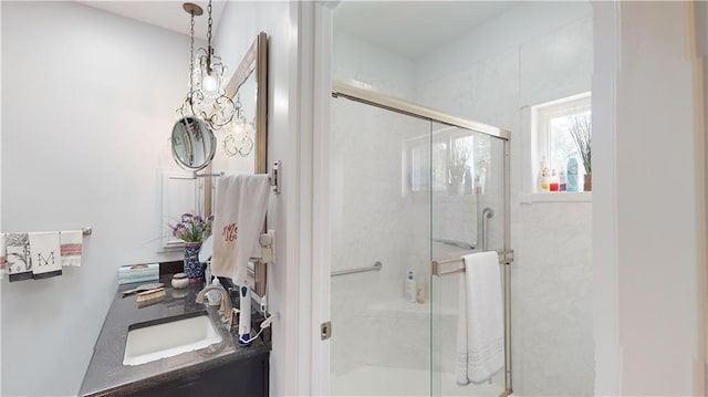 bathroom with vanity and walk in shower