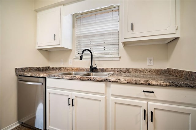 kitchen featuring white cabinetry, stainless steel dishwasher, and sink