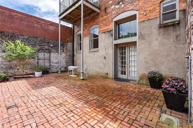 view of patio with a balcony