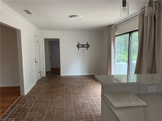 159 Conway Dr W, Mobile, AL 36608 - unfurnished dining area featuring brick patterned flooring, baseboards, and crown molding