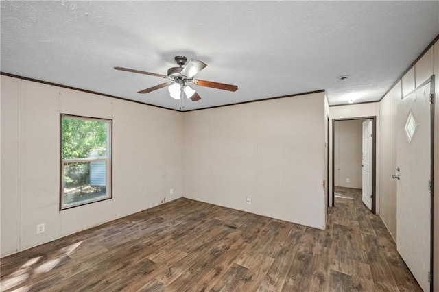 6550 Oak Grove Rd, Eight Mile, AL 36613 - unfurnished room with wood finished floors, a ceiling fan, a textured ceiling, crown molding, and a decorative wall