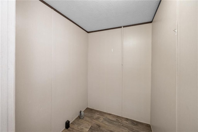 6550 Oak Grove Rd, Eight Mile, AL 36613 - unfurnished room featuring wood finished floors and a textured ceiling
