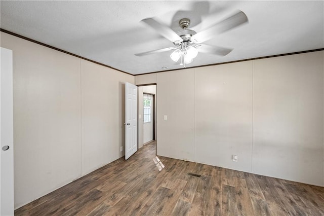 6550 Oak Grove Rd, Eight Mile, AL 36613 - unfurnished room featuring crown molding, wood finished floors, and a ceiling fan